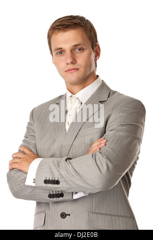 Junge attraktive Mann mit verschränkten Armen Stockfoto