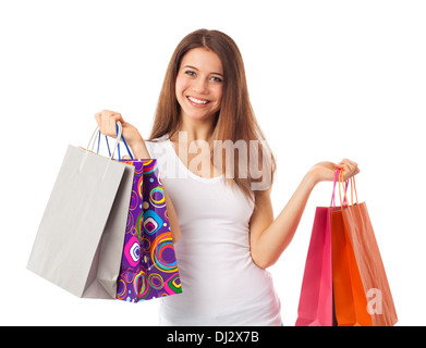 Junge schöne Frau mit Einkaufstüten, isoliert auf weiss Stockfoto