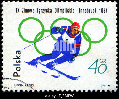 Polen - CIRCA 1964: Eine Briefmarke gedruckt in Polen zeigt Skifahren, Olympische Winterspiele statt an Innsbruck, ca. 1964 Stockfoto