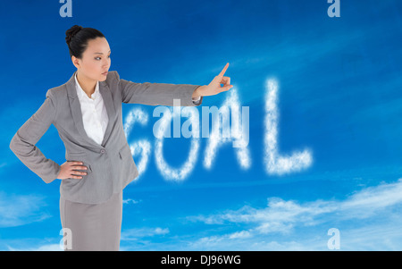 Zusammengesetztes Bild von Ernst asiatische Geschäftsfrau zeigt Stockfoto