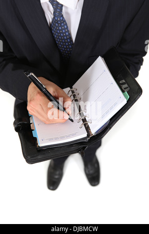 Mann, die Tagesordnung schriftlich Stockfoto