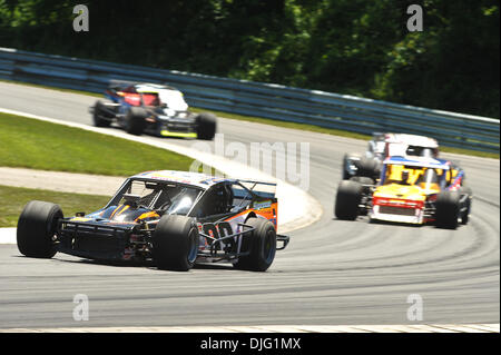 3. Juli 2010 - Lakeville, Connecticut, USA - 3. Juli 2010: Jamie Tomaino (99) verlässt die West-Kurve während der Lime Rock 100 in Lime Rock Park in Lakeville, Connecticut. (Kredit-Bild: © Geoff Bolte/Southcreek Global/ZUMApress.com) Stockfoto