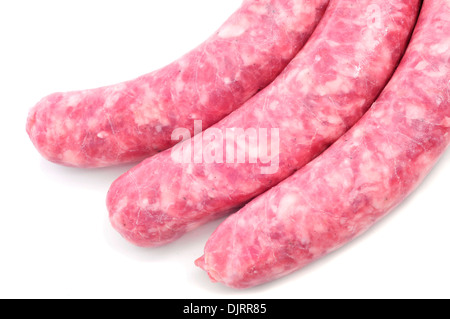 Closeup einige rohem Fleisch Schweinswürstl auf weißem Hintergrund Stockfoto