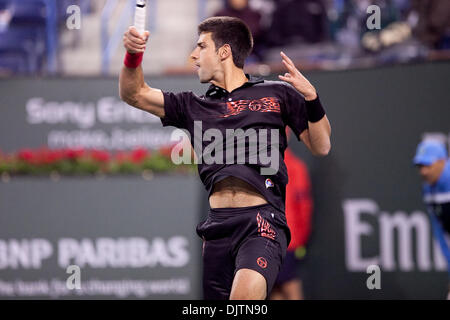 Mardy FISH (USA) blauen Hemd und Novak DJOKOVIC (SRB) schwarz Shirt - bei den 2010 BNP Paribas Open statt auf der Indian Wells Tennis Garden in Indian Wells, Kalifornien. Djokovic (SRB) besiegte Fish (USA) 6: 1, 0: 6, 6: 2. (Kredit-Bild: © Gerry Maceda/Southcreek Global/ZUMApress.com) Stockfoto