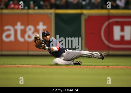 30. März 2011 - Haltestelle Houston, Texas, USA - Boston Red Sox-2 b macht Dustin Pedroia eine große Minute Maid Park im letzten Frühling Training Spiel für die Houston Astros. Boston Red Sox gegen die Houston Astros 10-0. (Kredit-Bild: © Juan DeLeon/Southcreek Global/ZUMAPRESS.com) Stockfoto