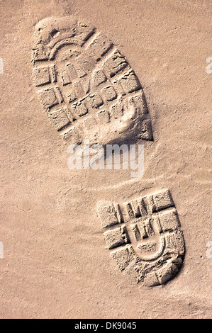 Shoeprint im sand Stockfoto