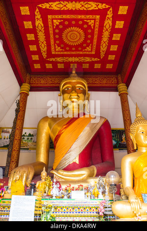 Buddha-Statue in einer Kapelle, Wat Phra, dass Hariphunchai Stockfoto