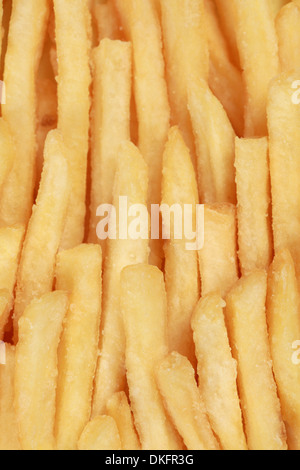 Pommes frites in Folge bildet einen Fast-Food-Hintergrund