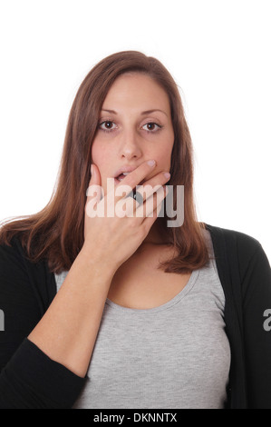 überrascht, junge Frau, die mit ihren weit geöffneten Mund mit der hand Stockfoto