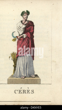Ceres, die römische Göttin der Landwirtschaft, mit Sense und Scheffel Weizen. Stockfoto