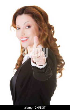 Attraktive Geschäftsfrau zeigt "OK". Isoliert auf weiss. Stockfoto