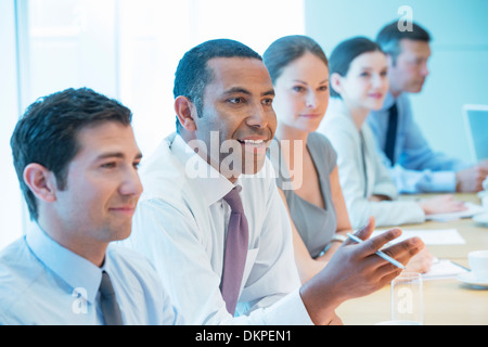 Business-Leute reden in treffen Stockfoto