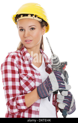 Junge Frau in Schutzhelm und Presslufthammer. Isoliert auf weiss. Stockfoto