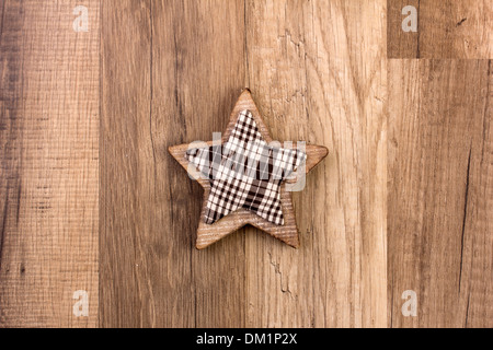 Dekoration mit hölzernen Hintergrund und mährischen Stern Stockfoto
