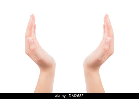 Frau die Hände halten etwas Unsichtbares, isoliert auf weiss. Sie können jedes Bild oder Symbol zwischen den Händen legen. Stockfoto