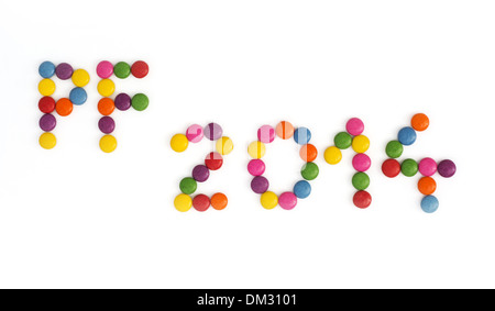 Der Titel PF 2014 geschrieben von bunten Smarties. Neues Jahr Thema. Stockfoto