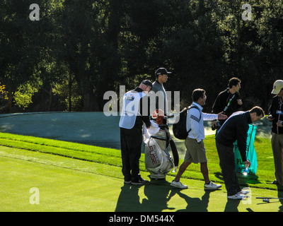 Tiger Woods und Teamkollegen weiter am Mittwoch zum ersten Abschlag Pro bin an der nordwestlichen gegenseitige World Challenge Stockfoto