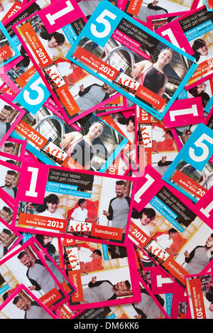 Pile of Sainsbury WE are Active Kids 2013 Gutscheine Sainsbury's Sainsbury Stockfoto