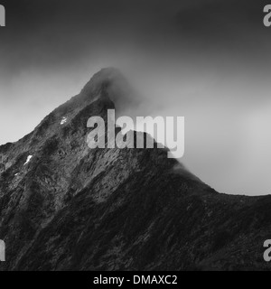 Wolken auf einem Bergmassiv, Nationalpark Jotunheimen, Norwegen Stockfoto