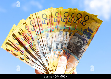 Person Holding australische Dollar Stockfoto