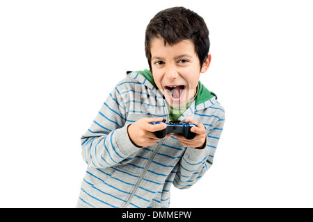 Jungen spielen von Videospielen, die Grimassen, die isoliert in weiß Stockfoto