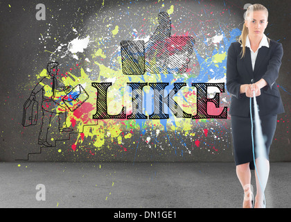 Zusammengesetztes Bild der Geschäftsfrau ziehen ein Seil Stockfoto