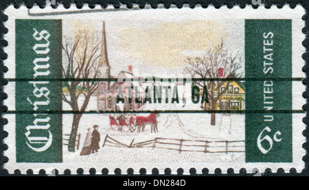 Eine Briefmarke gedruckt in USA (ATLANTA, GA Aufdruck), Weihnachts-Ausgabe zeigt Winter Sonntag in Norwegen, Maine Stockfoto