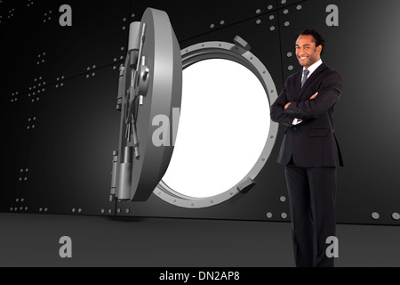 Zusammengesetztes Bild der Geschäftsmann mit verschränkten Armen Stockfoto