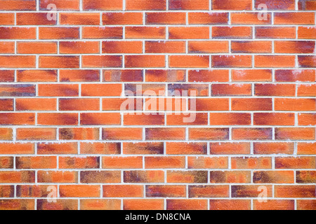 Plain flat Red brick wall aus roten Ziegeln und Mörtel in geraden Linien. England Großbritannien Großbritannien Stockfoto
