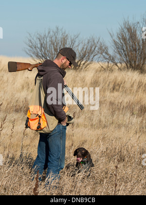 Ein Jäger und sein Hund Stockfoto