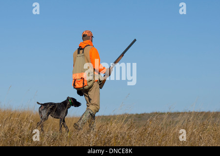 Ein Jäger und sein Hund Stockfoto