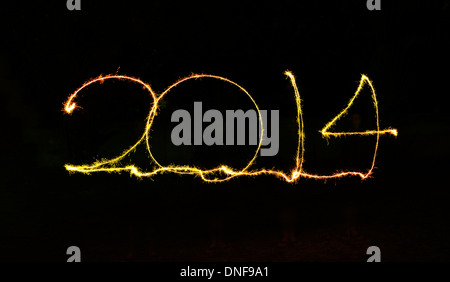Frohes neues Jahr 2014 in glitzernden Lettern geschrieben Stockfoto