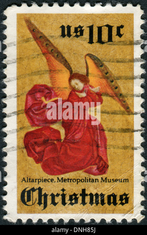 USA - CIRCA 1974: Briefmarke gedruckt in USA, Weihnachten Thema zeigt Angel, von Perussis Altarbild, 1480, ca. 1974 Stockfoto