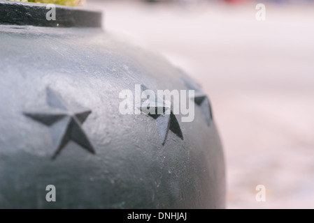 Pflanzer auf Straße in Austin, Texas Lone Star Embleme zieren Stockfoto