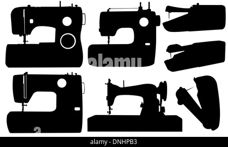Nähmaschinen-Satz isoliert auf weiss Stockfoto