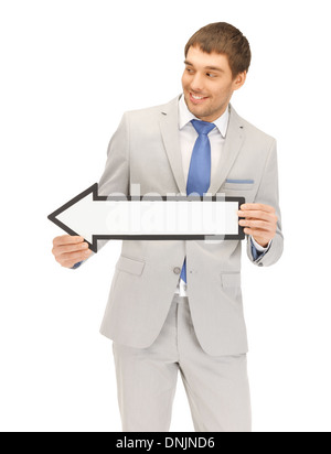 Geschäftsmann mit Pfeil Wegweiser Stockfoto