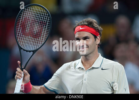 Brisbane, Australien. 1. Januar 2014. Roger Federer der Schweiz feiert nach dem zweiten Vorrundenspiel gegen Jarkko Nieminen Finnlands am Flughafen Brisbane-Tennis-Turnier in Brisbane, Australien, gewann seine Männer 1. Januar 2014 singles. Roger Federer gewann 2: 0. Bildnachweis: Bai Xue/Xinhua/Alamy Live-Nachrichten Stockfoto