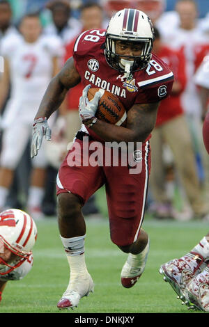 Orlando, Florida, USA. 1. Januar 2014. 1. Januar 2014: South Carolina Gamecocks Runningback Mike Davis #28 während der Capital One Bowl zwischen Wisconsin Badgers und die South Carolina Gamecocks im Citrus Bowl in Orlando, FL. Credit: Csm/Alamy Live-Nachrichten Stockfoto