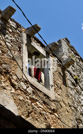 Plomin Istrien Kroatien alte Fischer Dorf Details menschliche Figur in das Fenster Stockfoto