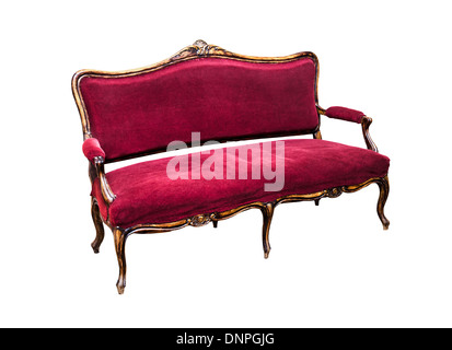 Alte rote samt Sofa isoliert auf einem weißen Stockfoto