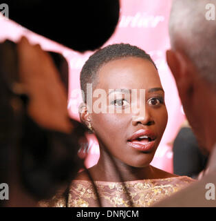 Palm Springs, Kalifornien, USA. 4. Januar 2014. Die Ankünfte der roten Teppich bei den Gala-Abend-Awards zum Auftakt der 25. Palm Springs Film Festival hier gesehen - LupitaNyong'o Credit: Motofoto/Alamy Live News Stockfoto