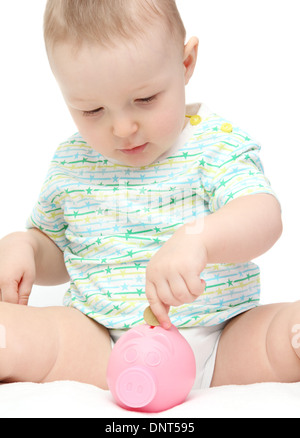 Baby mit Sparschwein Stockfoto