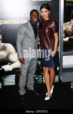 Kevin Hart und Eniko Parrish besuchen Sie die Premiere von "Grudge Match" im Ziegfeld Theatre in New York am 16. Dezember 2013. Stockfoto