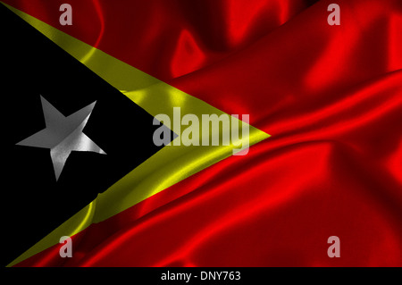 Ost-Timor Flag auf seidige Textur. Stockfoto