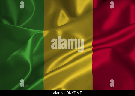 Mali Flagge auf seidige Textur. Stockfoto