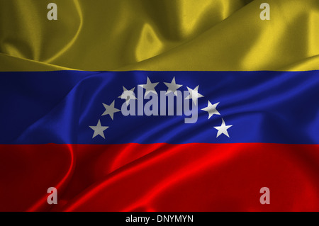 Venezuela-Flagge auf seidige Textur. Stockfoto