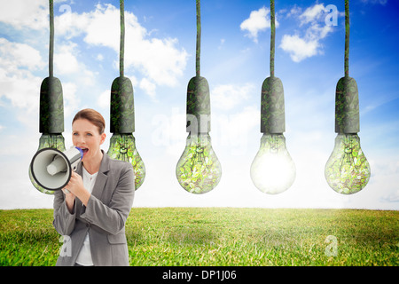 Montagebild Geschäftsfrau, reden über ein Megaphon Stockfoto