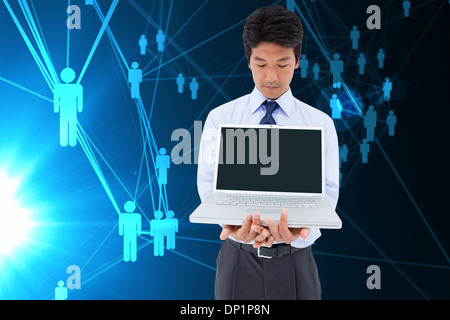 Zusammengesetztes Bild der Geschäftsmann mit einem laptop Stockfoto