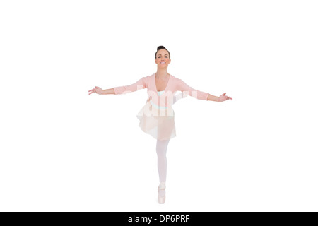 Wunderschöne Ballerina in einer Pose stand lächelnd Stockfoto