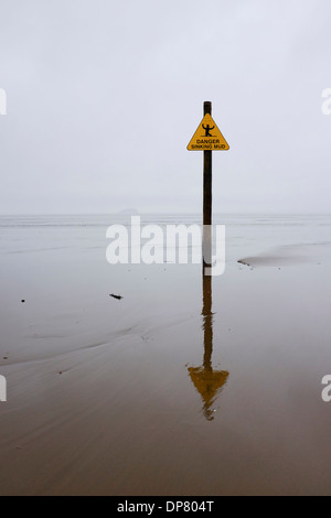 Warnzeichen für Gefahr sinkender Schlamm am Weston-Super-Mare Strand England Stockfoto